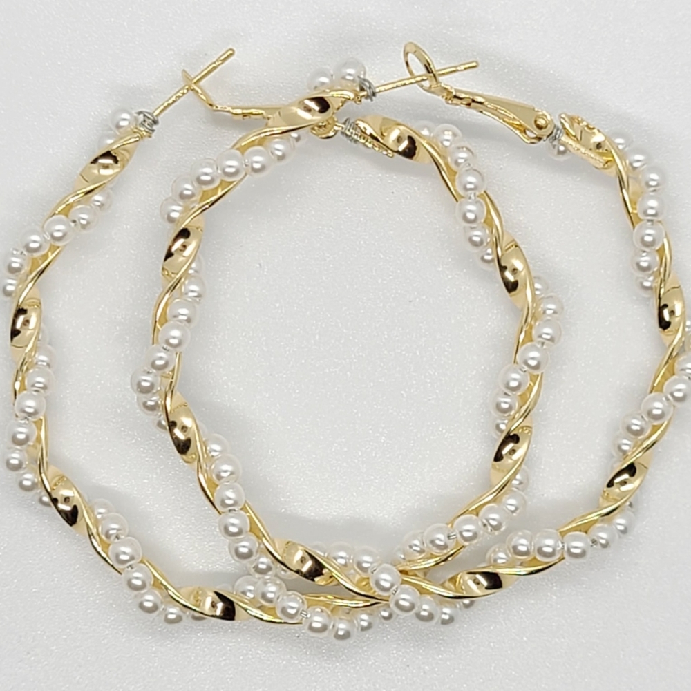 Gold Color And Faux Pearl twist design earrings